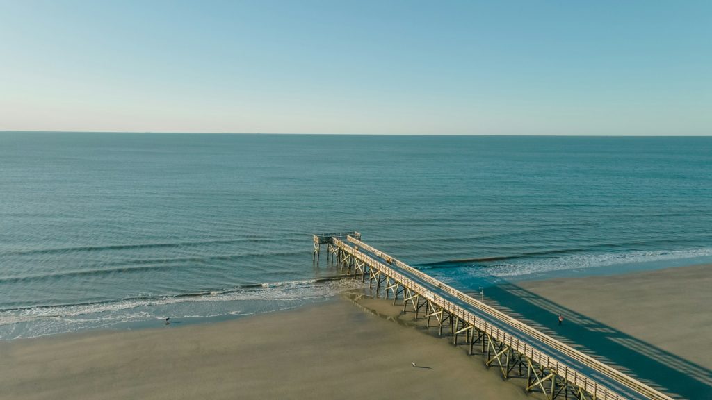 Beautiful view of the boardwalk over Isle of Palms beach in Charleston